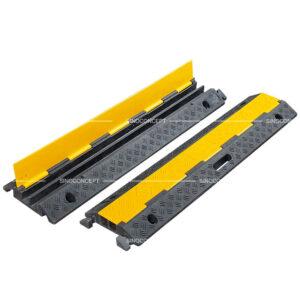 Passe-câble extérieur 2 canaux en composite plastique-caoutchouc avec poignée intégrée pour un transport facilité.